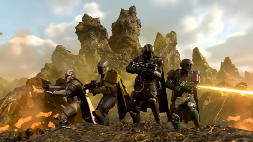 Four Armored Soldiers from Helldivers 2 Stand on A Rocky Volcanic-Looking Terrain - Is Helldivers 2 Crossplay?